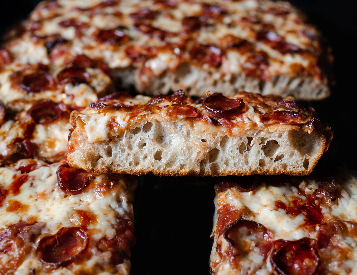 https://chiceats.com/sites/default/files/recipe/photo/sicilian-pizza-slice-crumb-pepp-830b.jpg