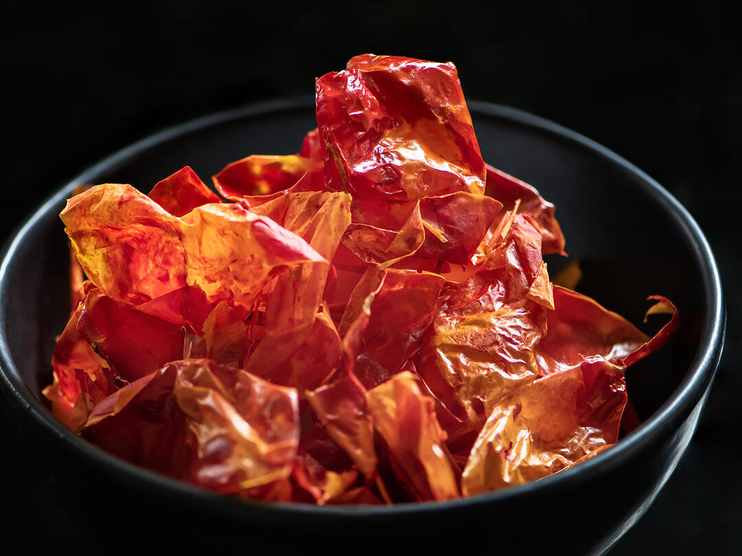 Dried tomato skins in a bowl.