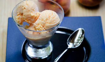 Scoop of Eggless Peach Ice Cream